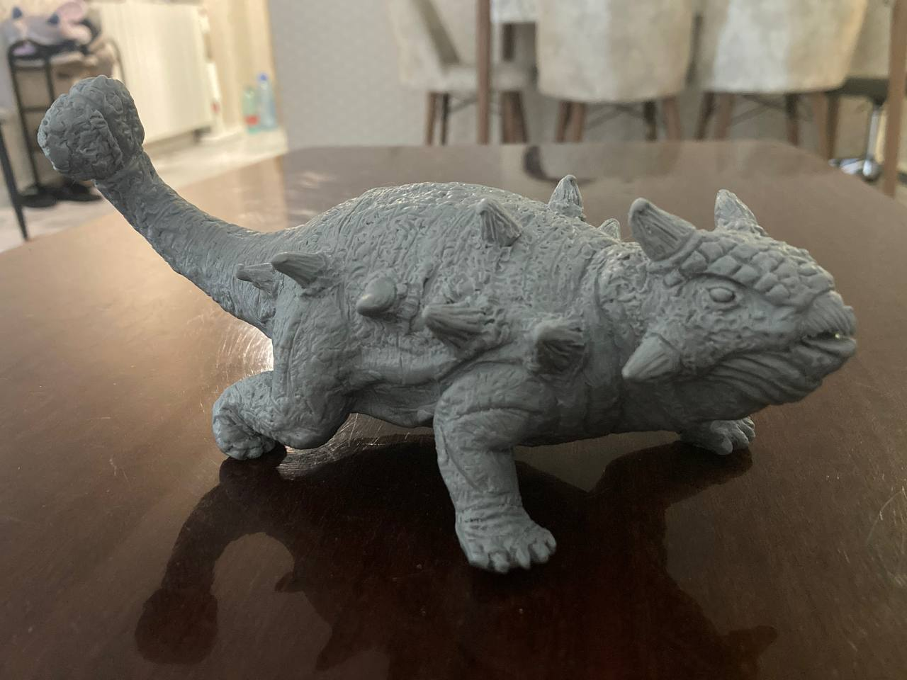 Detailed handmade ankylosaur clay sculpture