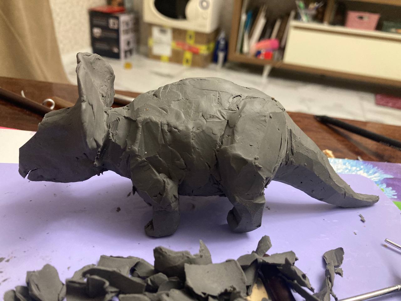 Triceratops clay sculpture in progress